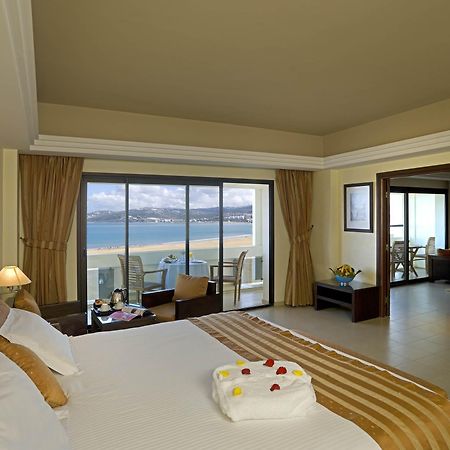 Отель Barcelo Tanger Экстерьер фото A bedroom in a hotel