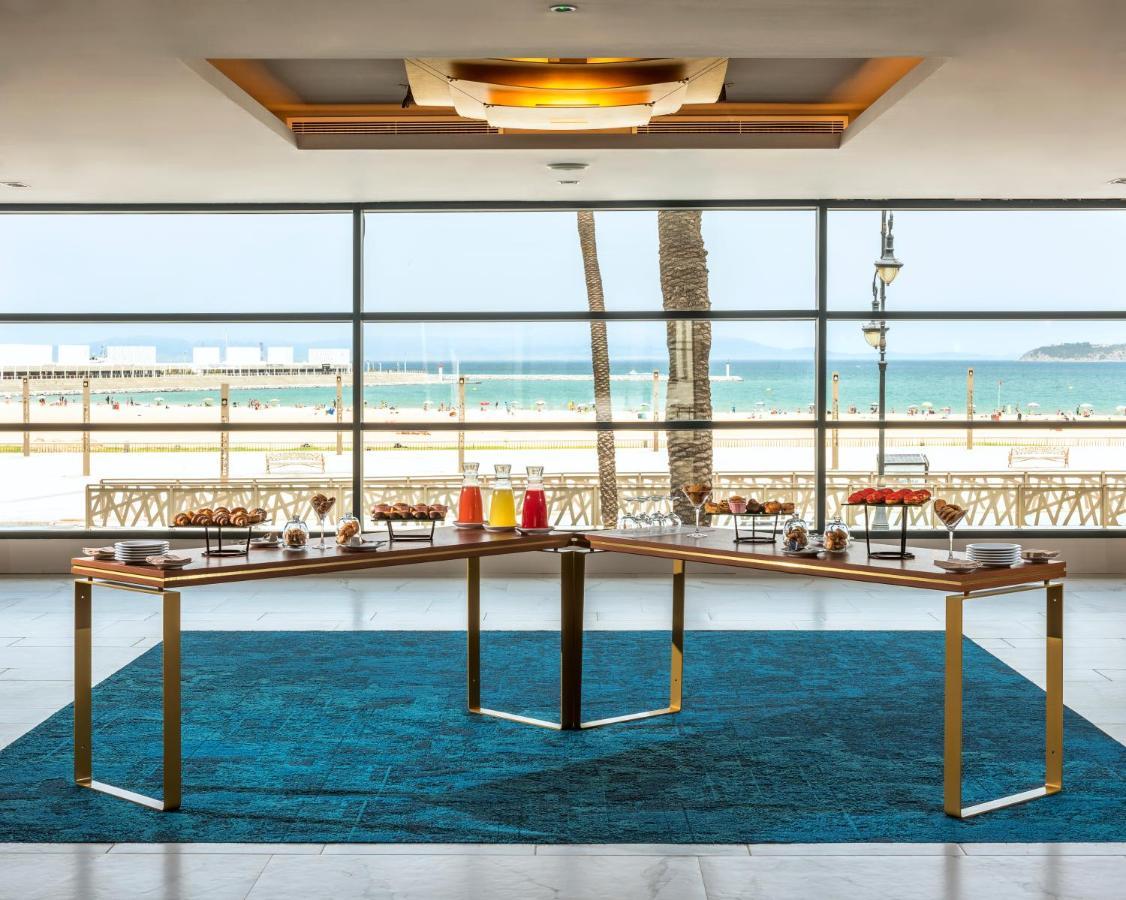 Отель Barcelo Tanger Экстерьер фото The lobby at the Hilton Tel Aviv